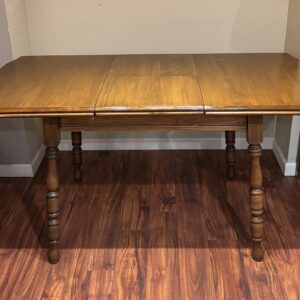Vintage Dining Table w/ hidden leaf. 30" tall x 30" wide x 43"-58" long (15" leaf)